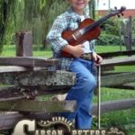 Carson Peters and his fiddle are going strong